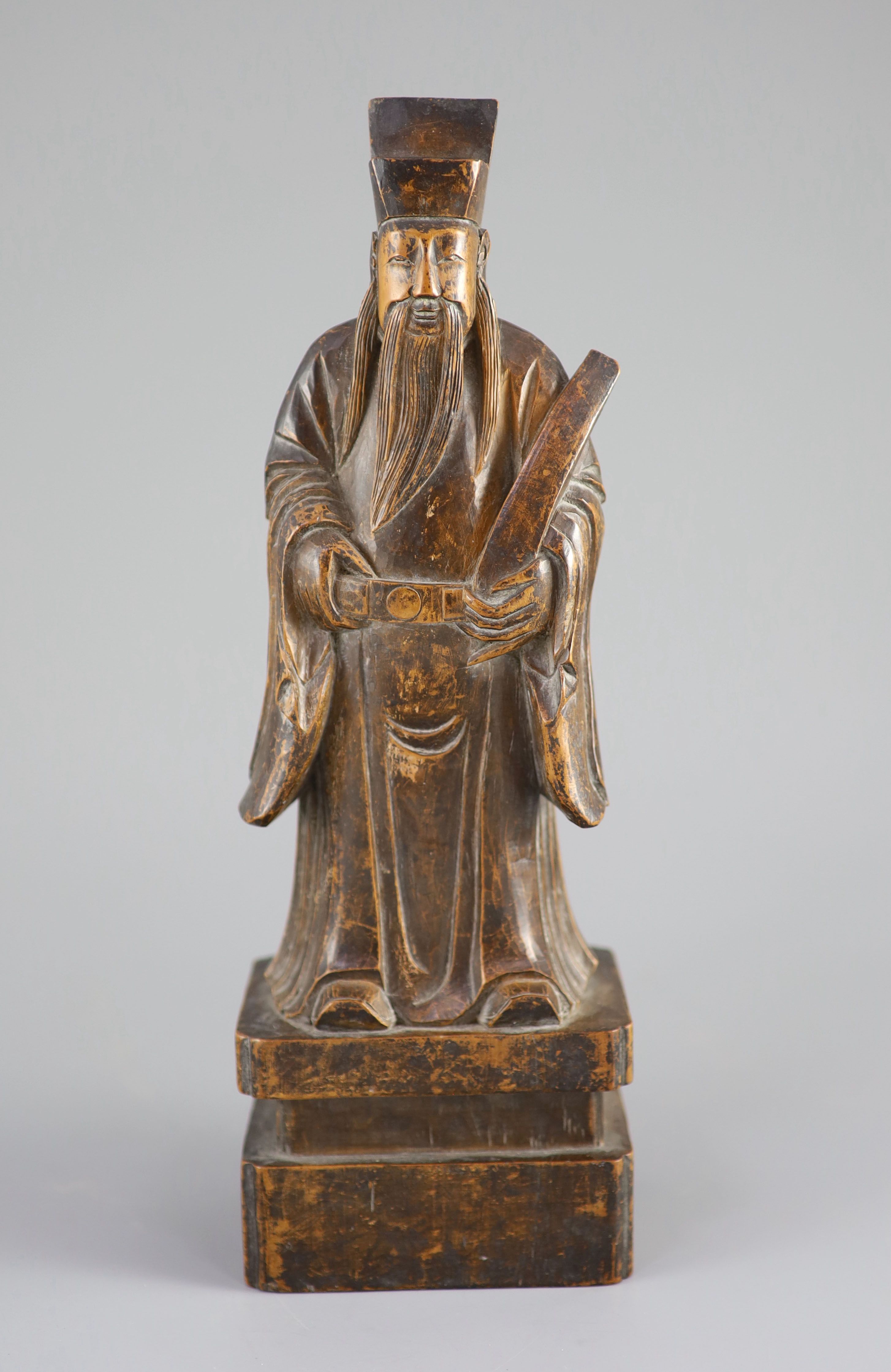 A Chinese boxwood figure of an immortal, 19th century, 29.5 cm high